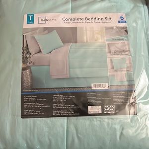 Twin bed set, never used.